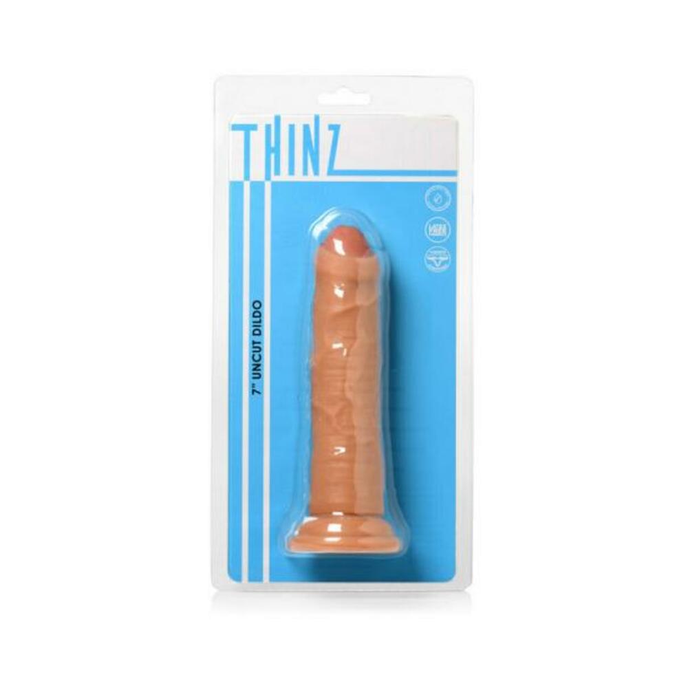 653078944068_1 Thinz Uncut 6.3 In. Dildo Light - Image 1