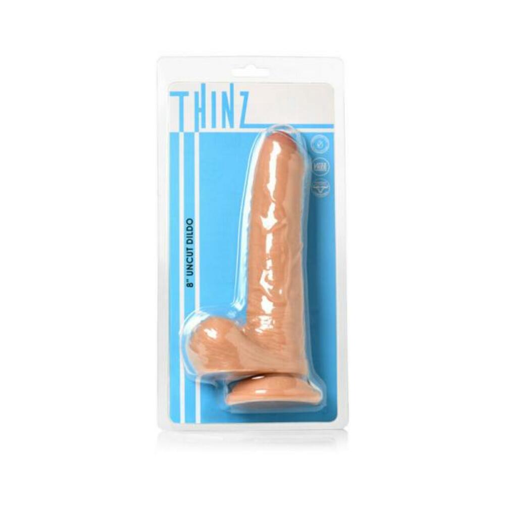 653078944099_1 Thinz Uncut 7.3 In. Dildo With Balls Light - Image 1